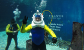 ATLANTIS, THE PALMand 104.8 Channel 4 BREAK THE Guinness WORLD RECORDs™ TITLEFOR LONGEST UNDERWATER live RADIO BROADCAST