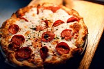 بمناسبة اليوم العالمي للبيتزا: مطعم برو هاوس يطرح عرض اشترِ بيتزا واحصل على الثانية مجاناً 